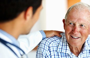 Doctor reassuring a patient