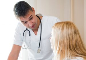 Doctor speaks with patient