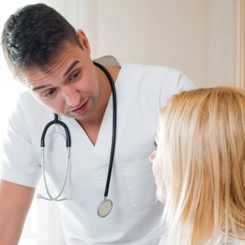 Doctor speaks with patient