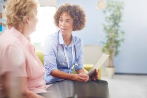 patient talking with doctor about treatment 