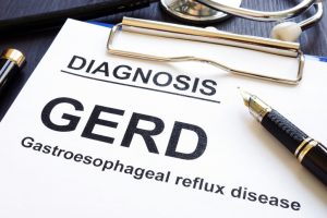 Gastroesophageal reflux disease GERD on a clinic desk.